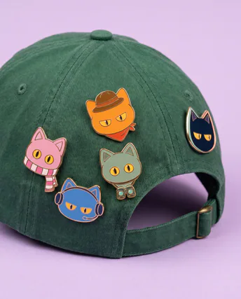 Pins on a green cap