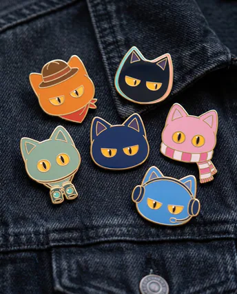 Enamel pins of the five crew heads